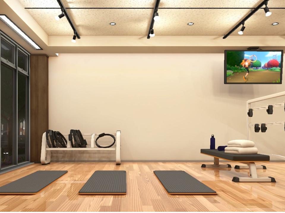 リングフィットを活用したトレーニングができるフィットネススタジオの様子。マットとテレビ、リングコンが設置されている。